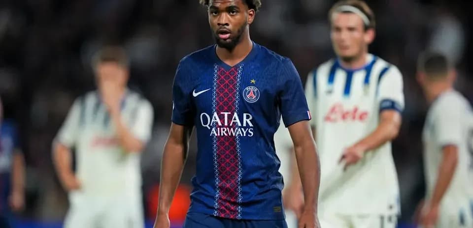 PSG player walking on pitch during match
