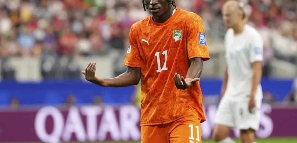 Ivorian player gesturing during a match