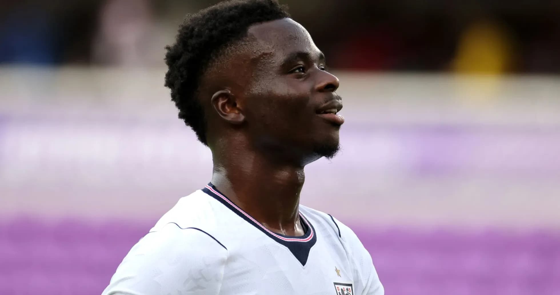 Player in England kit during match celebration