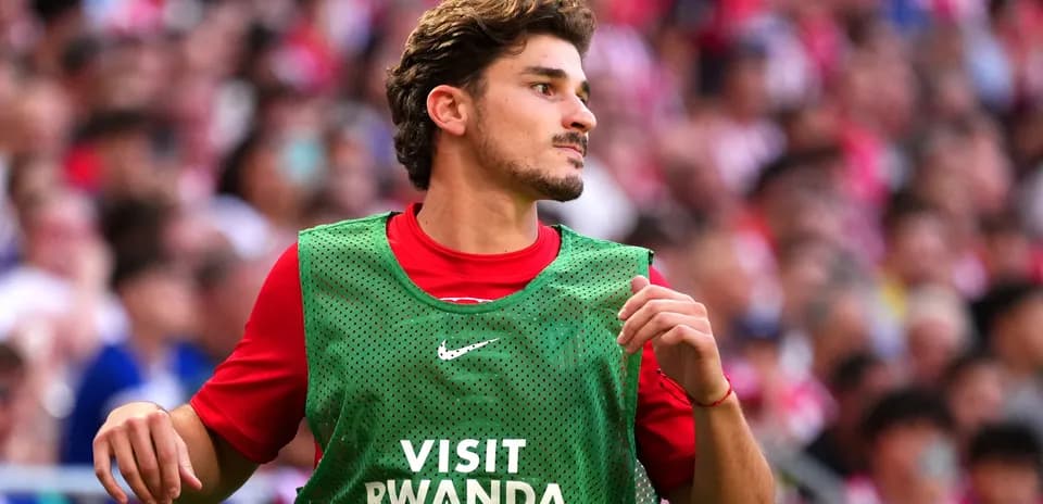 Player in warm-up vest during match preparation