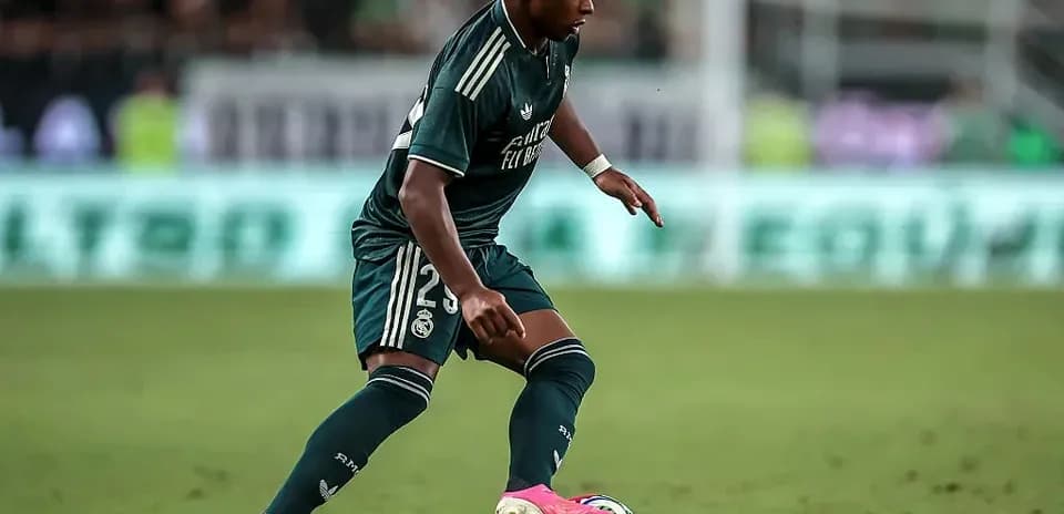 Player dribbling the ball on the field