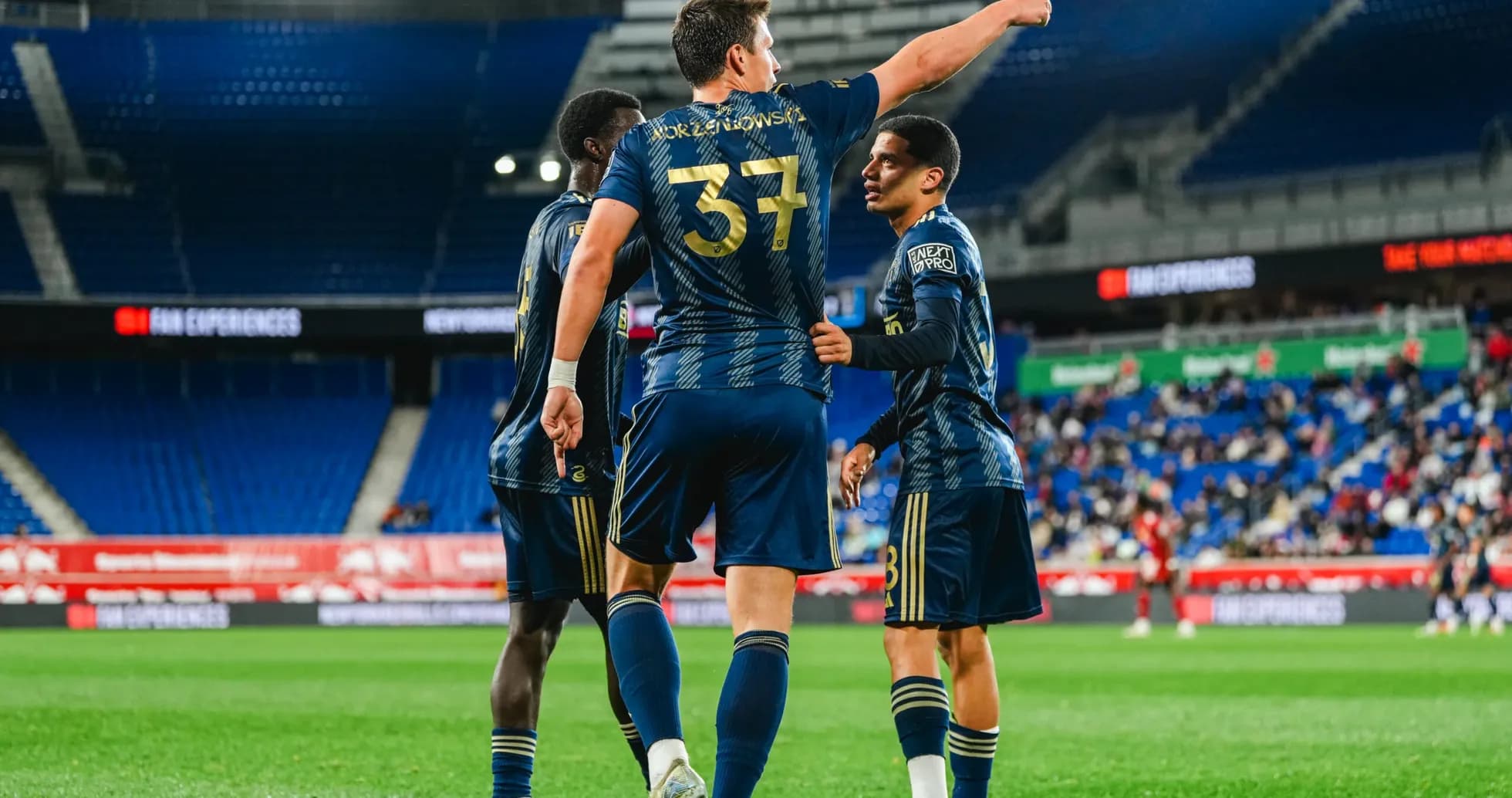 Players celebrating a goal during match