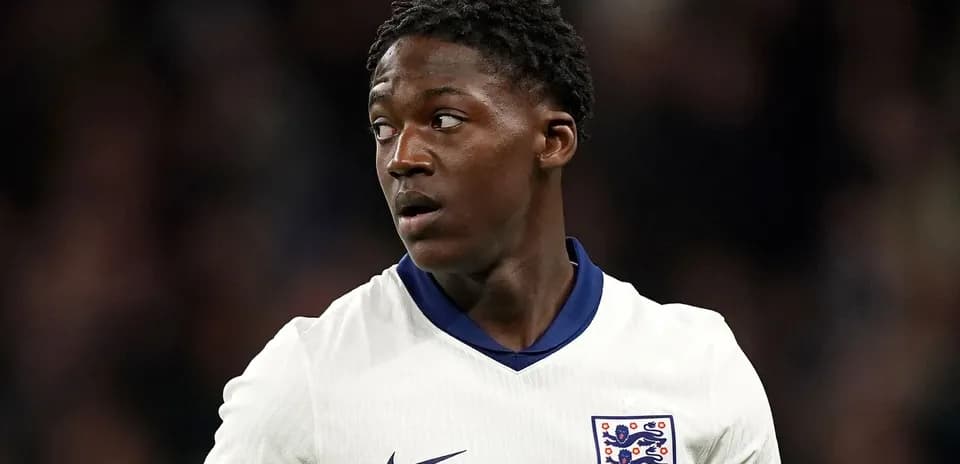 Player in England jersey during match action
