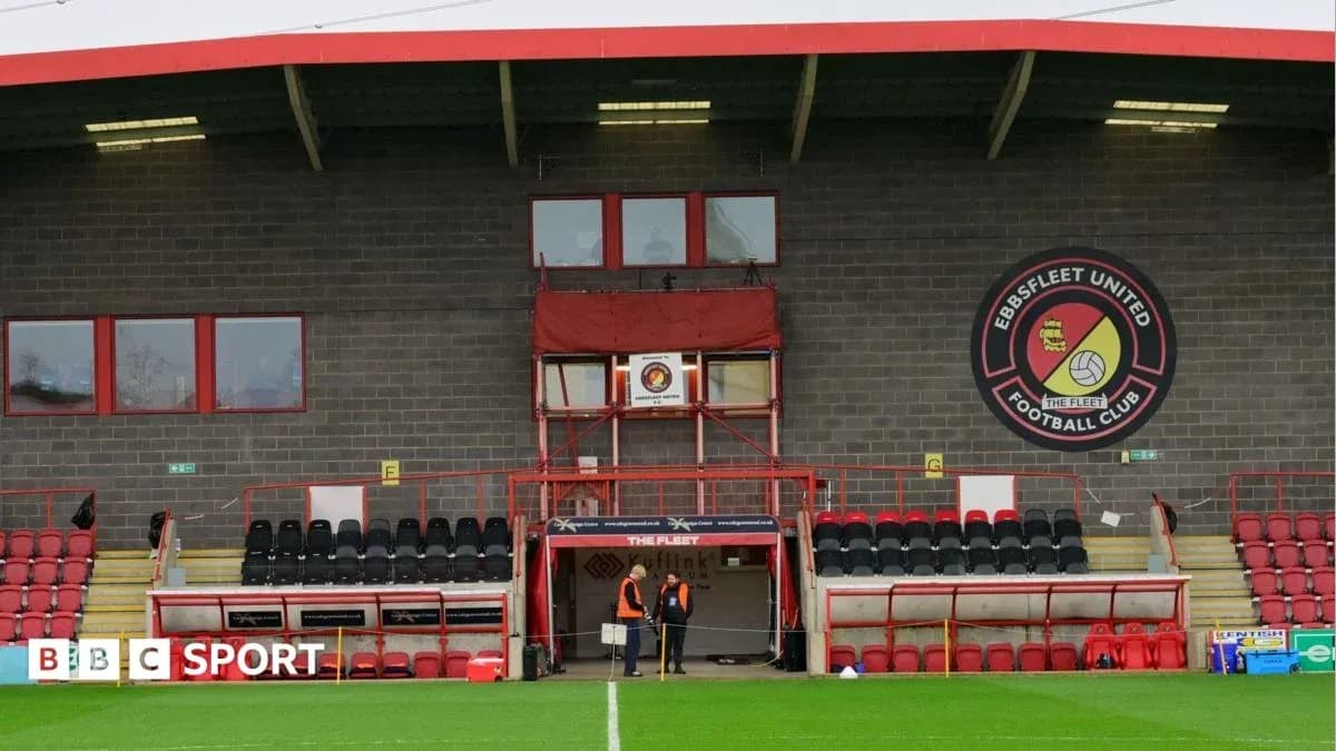 Ebbsfleet United's stadium with staff near entrance