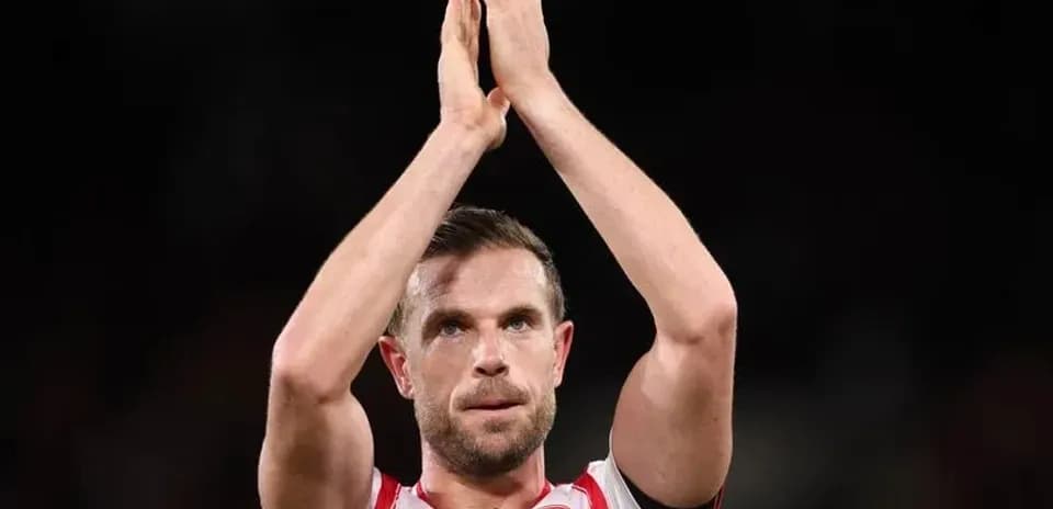 Player applauding fans after the match