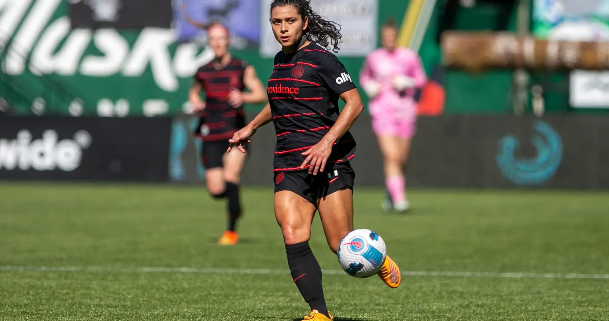 Portland Thorns player dribbling during match