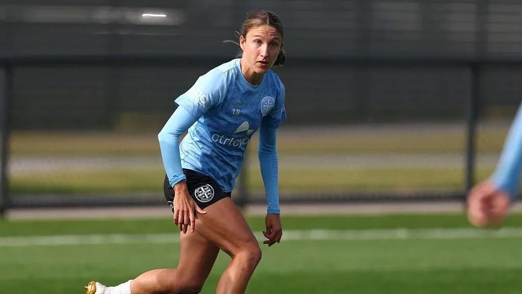 Player running during training session on pitch