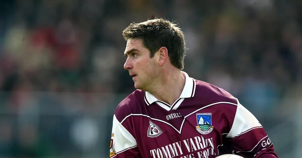 Player in maroon jersey during a match