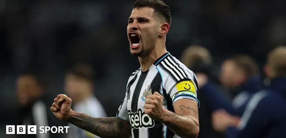 Newcastle player celebrating with clenched fists