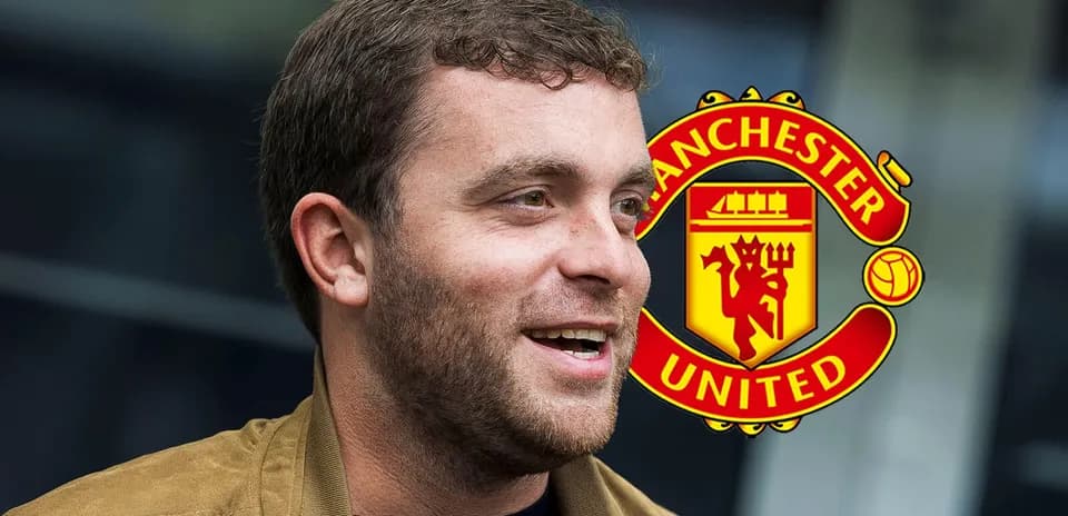 Person smiling with Manchester United logo in background