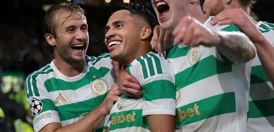 Celtic players celebrating a goal together