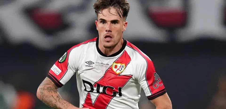 Player in Rayo Vallecano jersey running during match