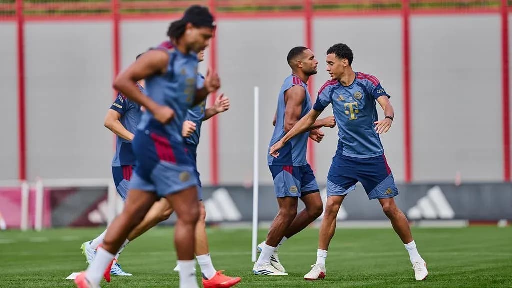 Players training on the pitch during practice session