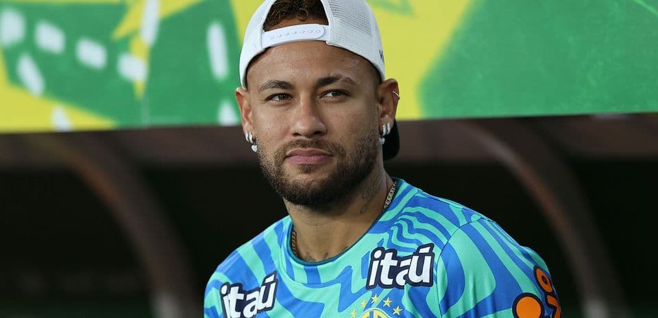 Football player in Brazil training kit at event