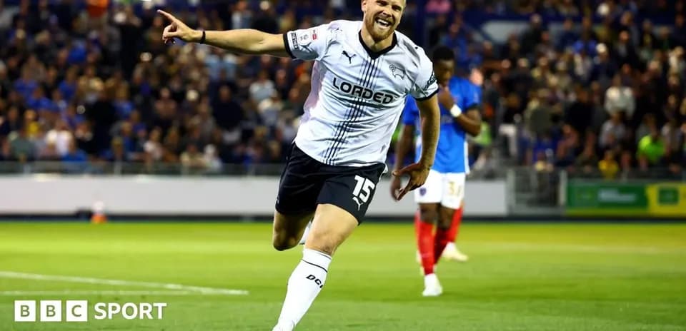 Player celebrating a goal on the field