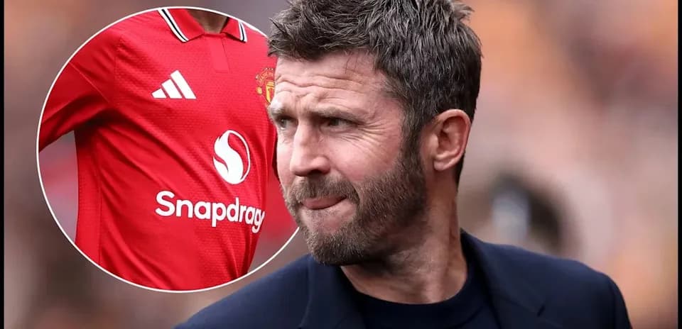 Michael Carrick walking on the pitch at a match