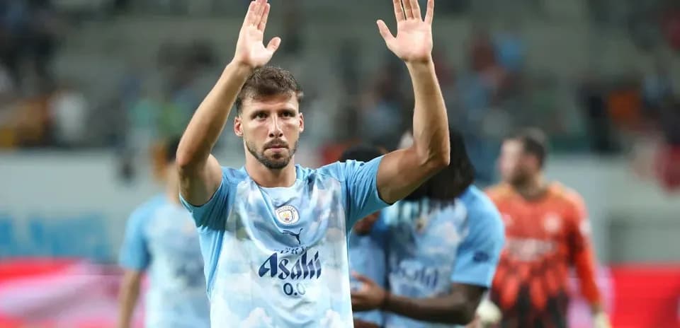 Player waving to fans after the match