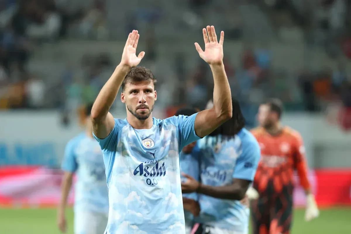 Player waving to fans after the match