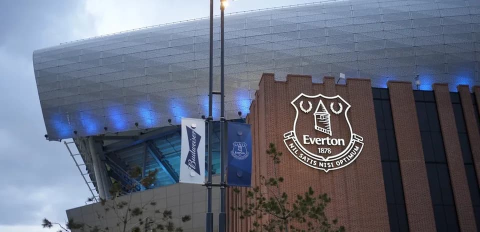 Exterior of Everton's stadium with club logo displayed