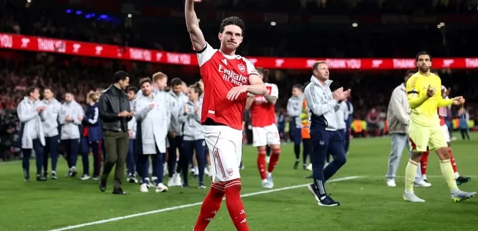 Player waving to fans after the match at Emirates Stadium