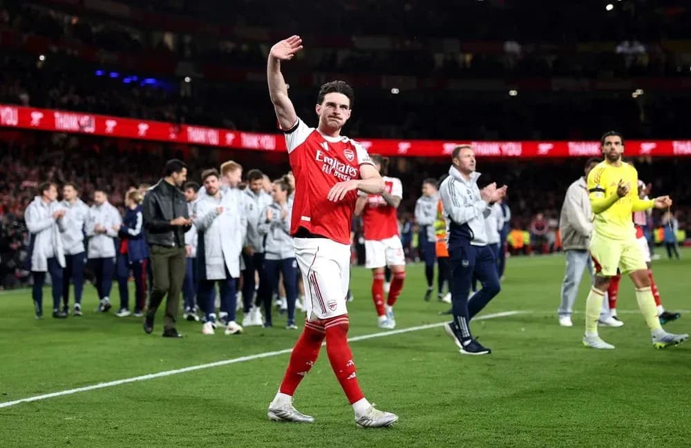 Player waving to fans after the match at Emirates Stadium