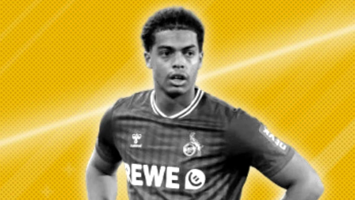 Player wearing REWE jersey on yellow background