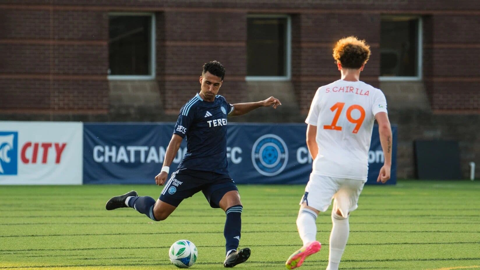 Player kicking ball during FC Cincinnati II match