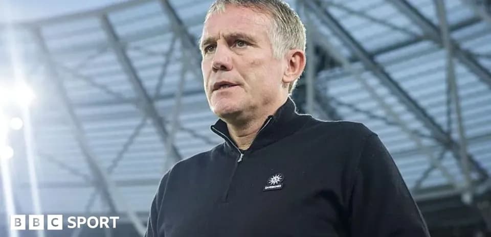 Manager at stadium during press conference
