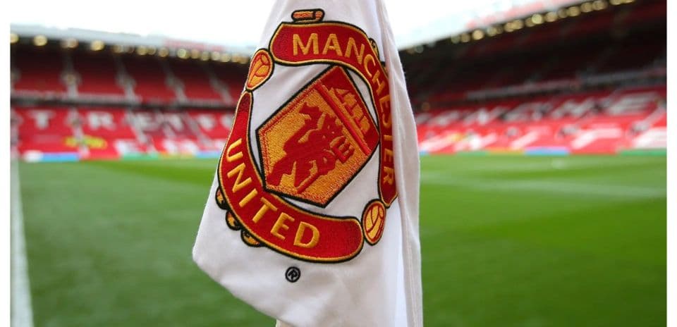 Corner flag with Manchester United logo at stadium