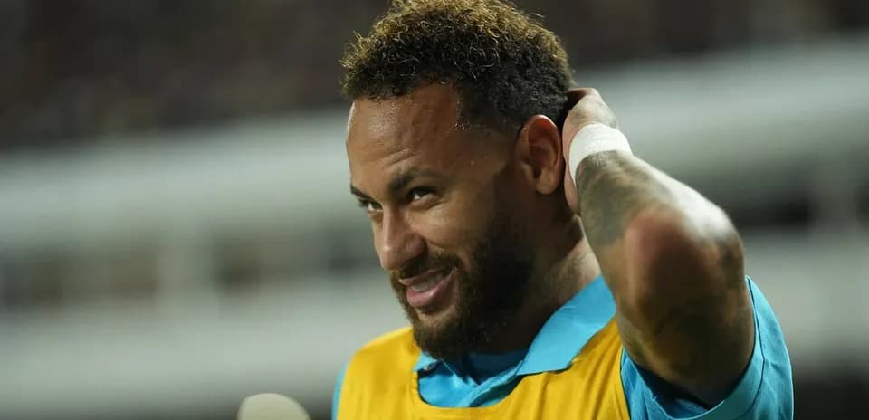 Neymar adjusting his hair during warm-up session