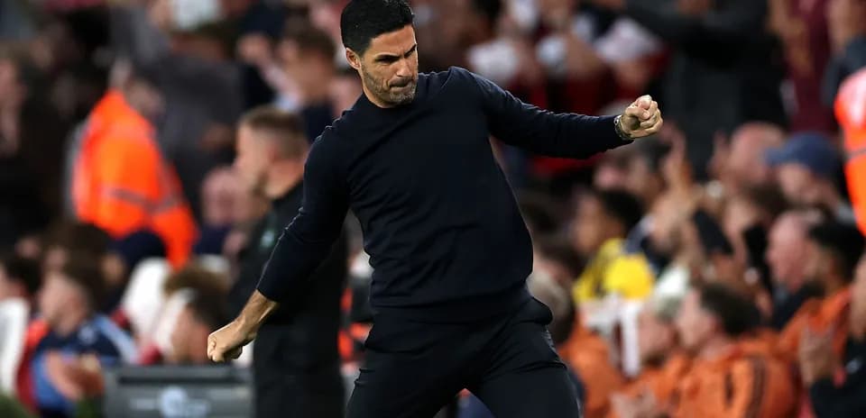 Manager celebrating a goal during a match