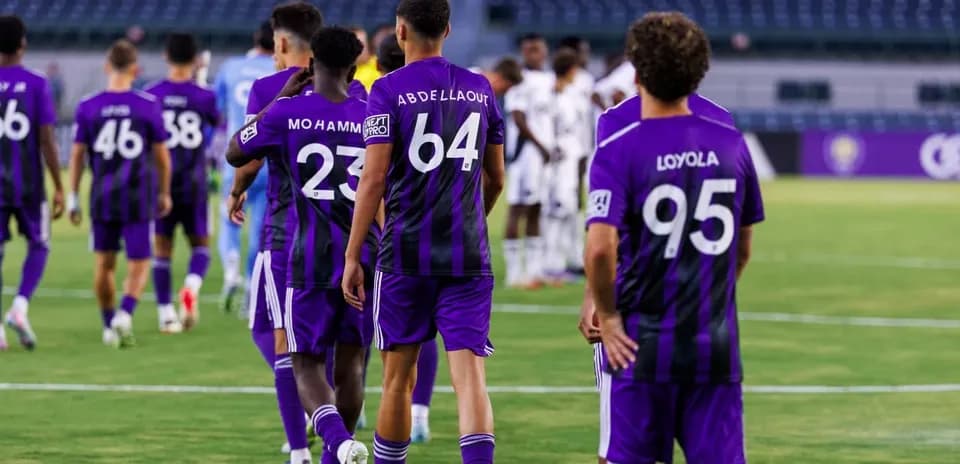 Orlando City II players walking onto the field