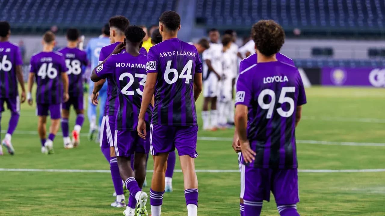 Orlando City II players walking onto the field