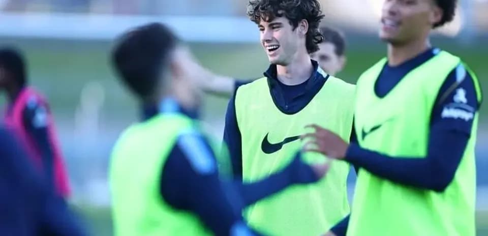Players in training session wearing green vests