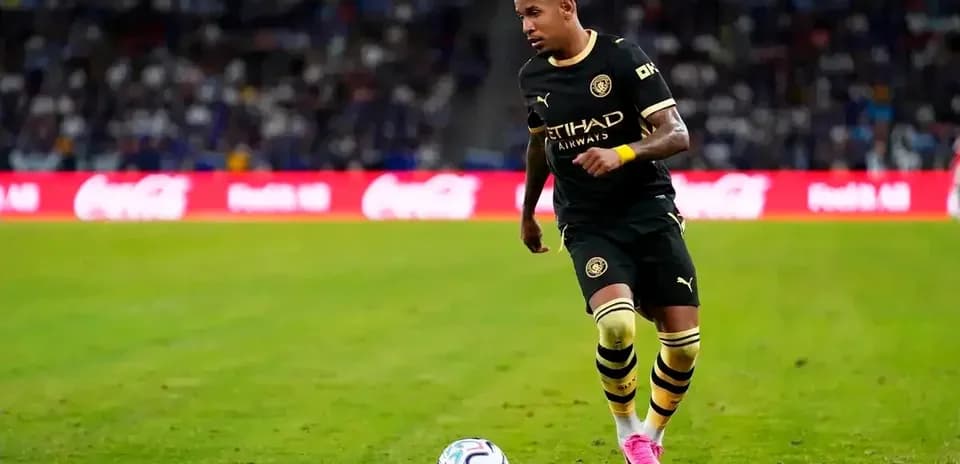 Player dribbling the ball on the field