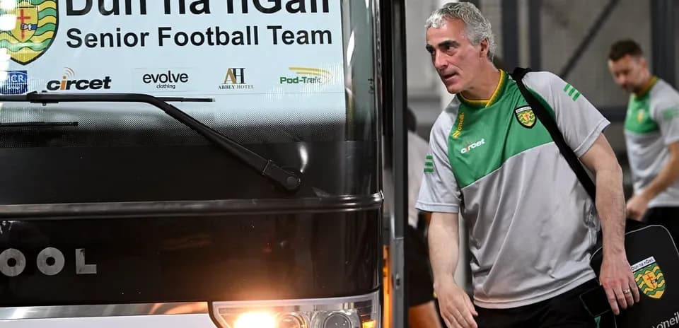Manager arriving at bus for Dún na nGall team
