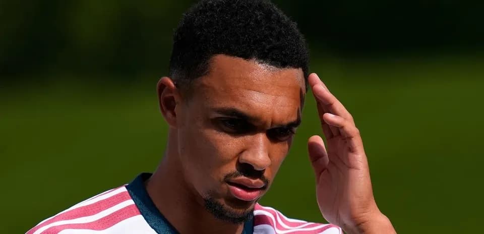Player with hand on forehead during training session