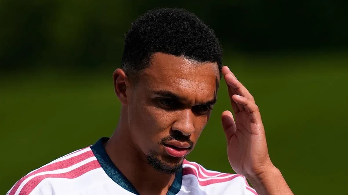 Player with hand on forehead during training session