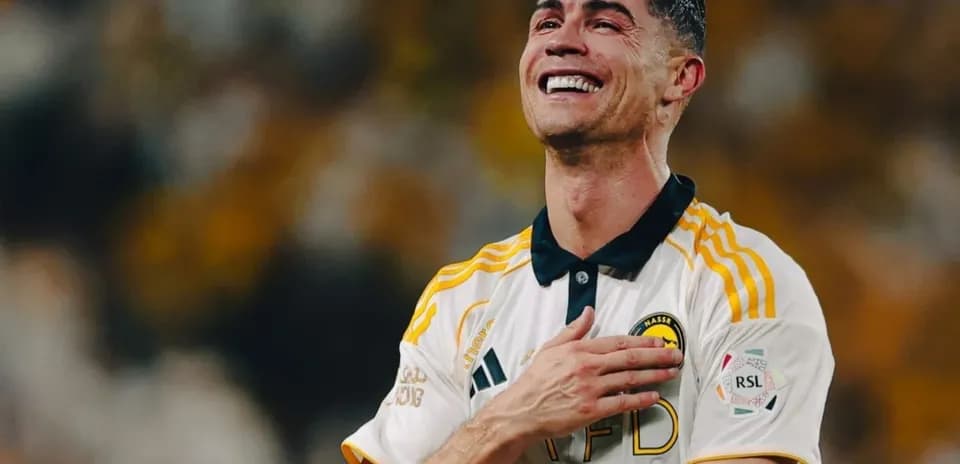 Player celebrating with a smile after match