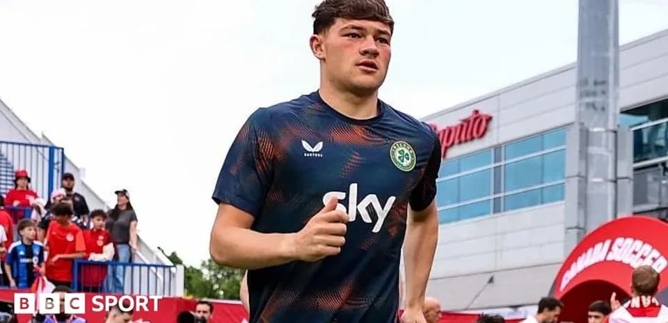 Player jogging towards the pitch before match