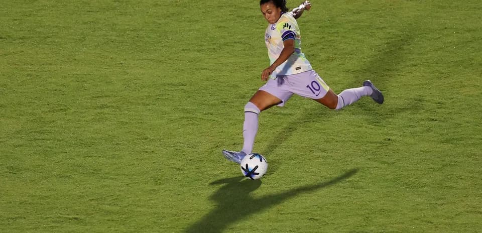 Player kicking ball during NWSL match