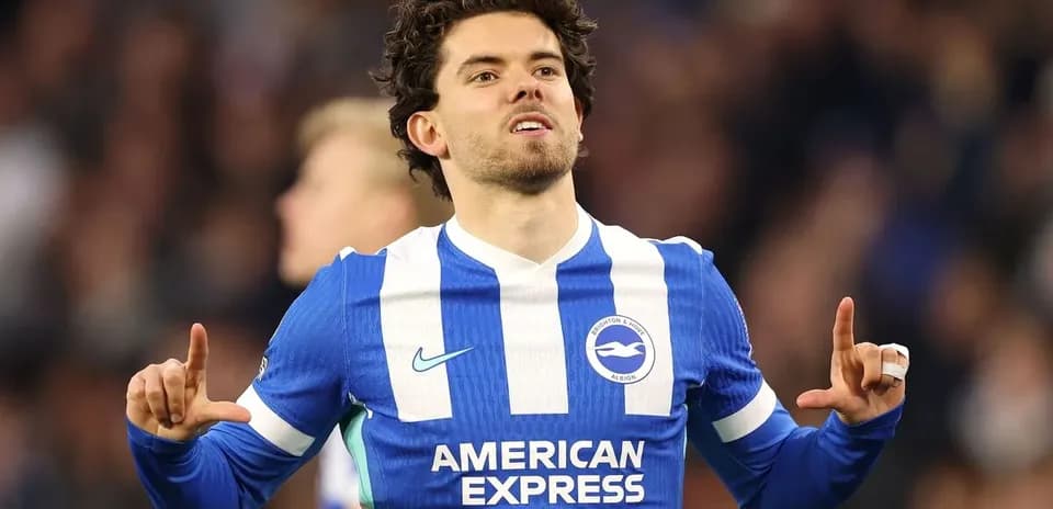 Player celebrating in Brighton & Hove Albion kit