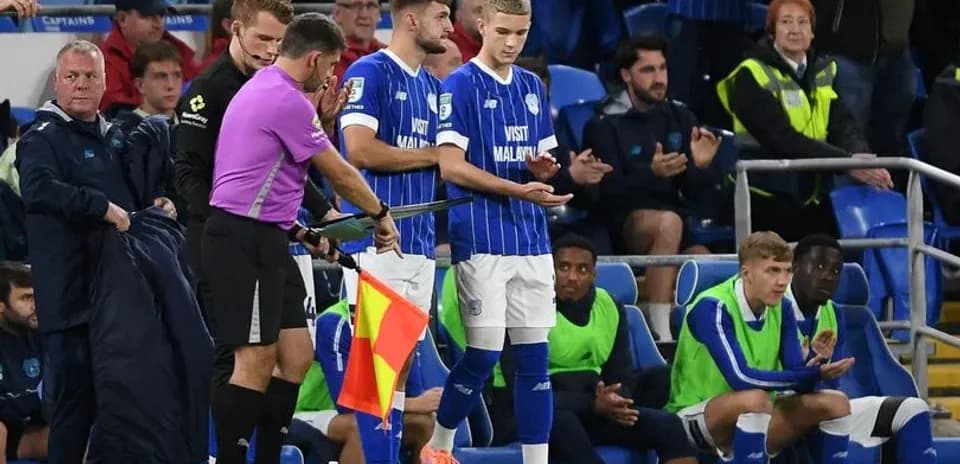 Substitution taking place during a football match