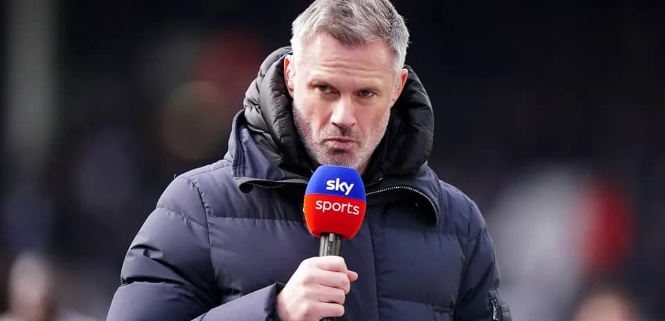 Sportscaster speaking into microphone on field
