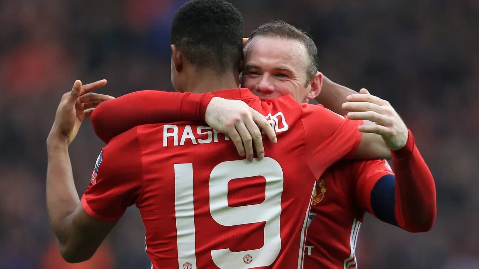 Two Manchester United players celebrating a goal