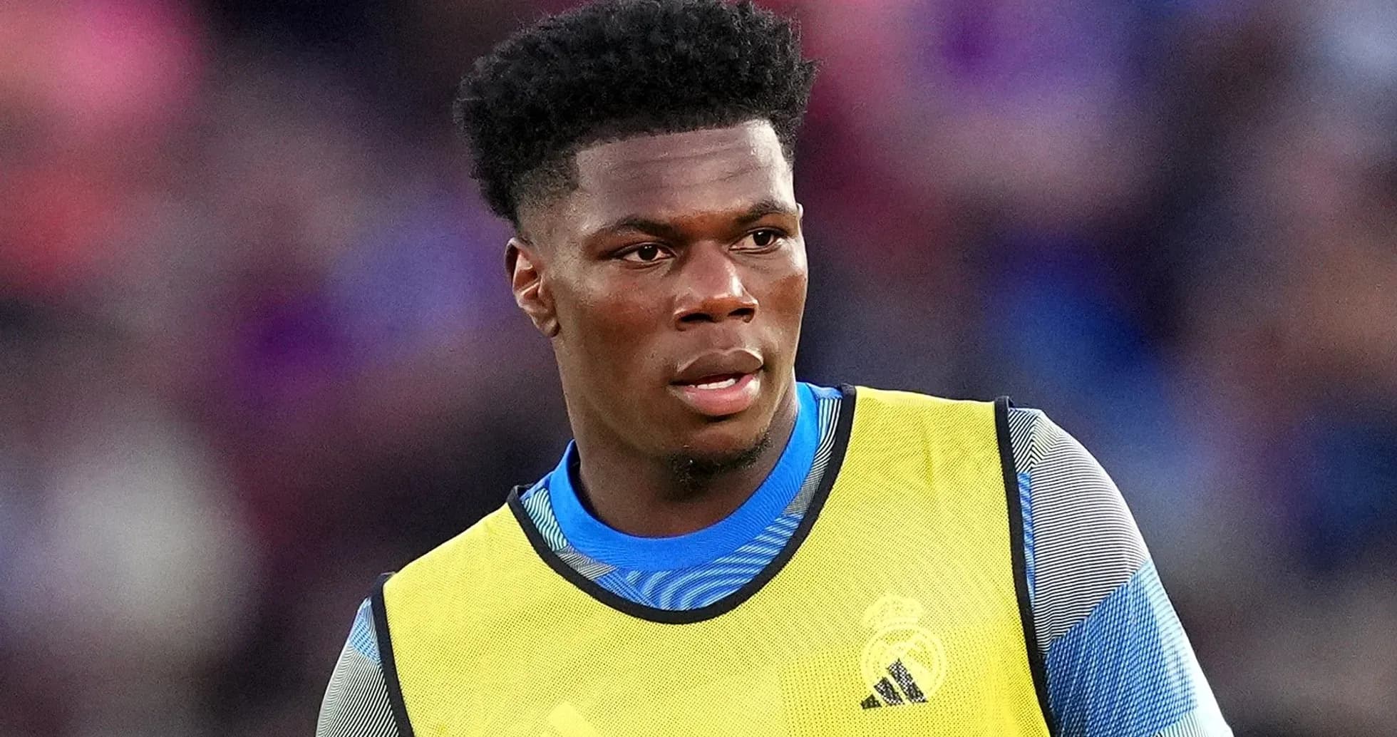 Player in training bib during warm-up session