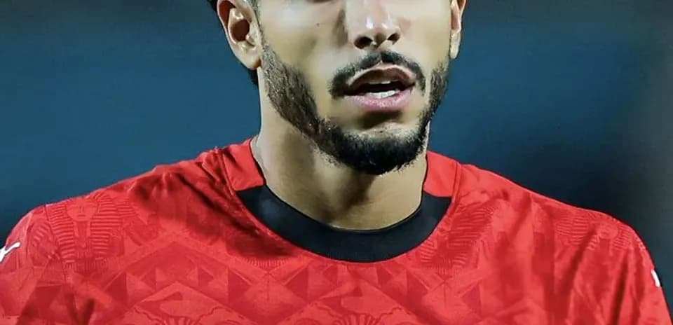Player in red jersey during match