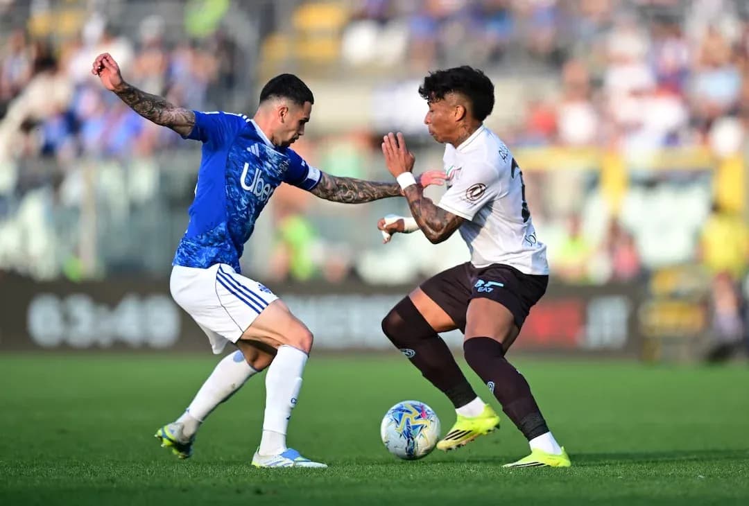 Players competing for the ball during Serie A match
