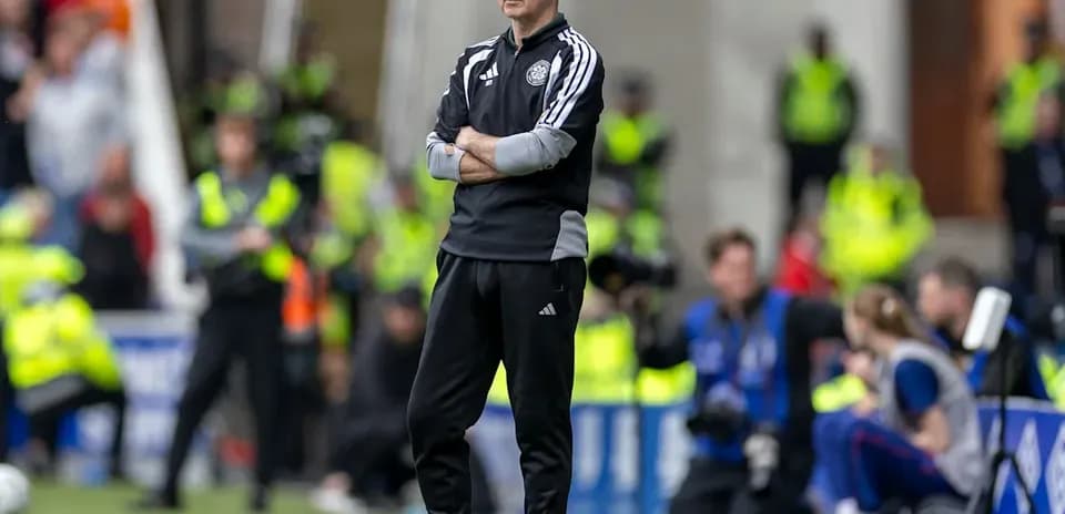 Coach observing the match from the sideline