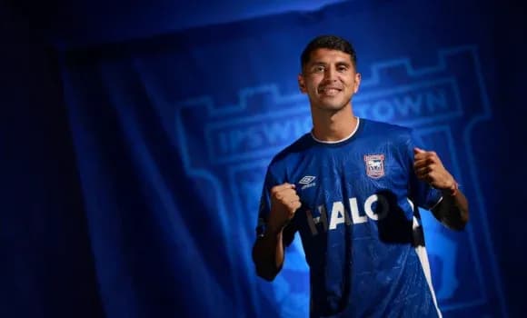 Player celebrating in Ipswich Town jersey